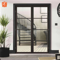 Porte battante française moderne en aluminium noir avec double vitrage et grille décorative pour entrée intérieure/extérieure de villa de luxe