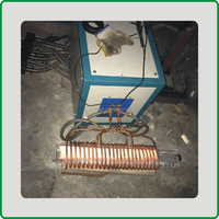 Machine de forgeage de billettes d'acier à chauffage par induction haute et moyenne fréquence avec bobines d'induction