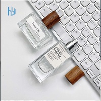 Flacon de parfum avec couvercle en bambou et couvercle en bois avec logo personnalisé en stock