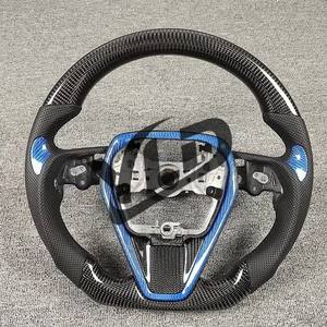 <span class=keywords><strong>Volante</strong></span> de Fibra de Carbono Forjado Personalizado para Toyota Camry Gen 8th 2018-2023 Estilo <span class=keywords><strong>Deportivo</strong></span> <span class=keywords><strong>TRD</strong></span> con Forma de D y Cuero Perforado - Product Image 1