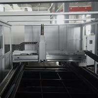 Machine de découpe laser à fibre Hoysook 3000w 6000w entièrement fermée avec table d'échange pour la découpe de tôles
