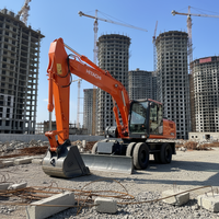 Excavatrice sur pneus Hitachi ZX130W avec peinture d'origine, moteur Isuzu, 13 tonnes, 87,2 kW, haute performance, en stock