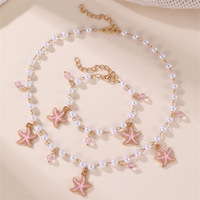 Collier bohème d'été avec pendentif étoile de mer et perles, chaîne de clavicule coquillage