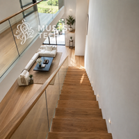 Escalier mono-à-capitère sur mesure, design architectural minimaliste intérieur, fabrication professionnelle et ingénierie