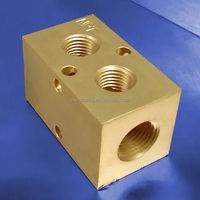 Pièces usinées sur commande par CNC, bloc de distribution d'eau en laiton
