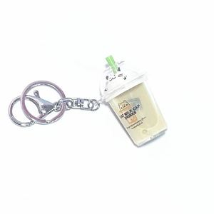 Porte-clés en acrylique avec pendentif chat mignon de dessin animé et paillettes, avec tasse de thé au lait et sable mouvant liquide, pour sacs et voitures (femmes, hommes, enfants) - Product Image 1