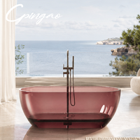 Baignoire autoportante moderne en résine transparente, baignoire en acrylique colorée transparente pour hôtels et villas avec accessoire de vidange