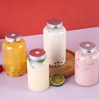 Vente en gros Bouteilles de boisson de jus transparentes rondes PET jetables de 500ml Bouteille d'eau vide en plastique transparent avec couvercle pour lait