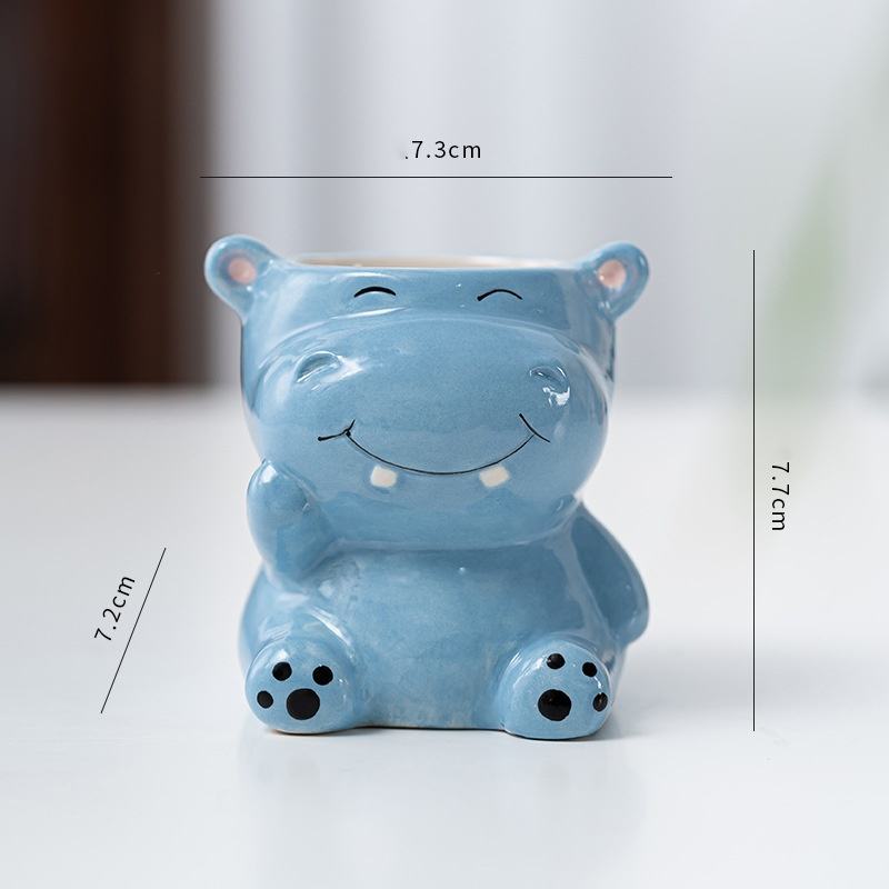 Hippopotame peint en bleu