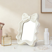 Miroir de maquillage portable carré à nœud décoratif, électroplaqué, en plastique uni, pour bureau, à sens unique, emballé individuellement – Meilleure vente