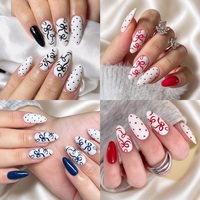 96 faux ongles en ABS de style français, en boîte, forme amande, motif pois et nœud papillon, doux et tendance, réutilisables, couvrance totale avec colle