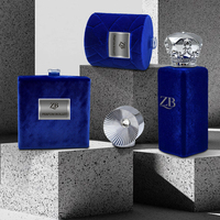 Flacon de parfum carré bleu personnalisé en verre avec finition velours floqué, vide, capacité 100 ml, couvercle métallique pour emballage