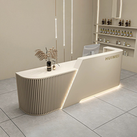 Comptoir de réception de spa moderne en forme de L Bureau d'accueil en pierre à surface solide Salon de beauté Conception libre Tailles personnalisées disponibles