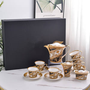 Service à thé en céramique avec tasses et soucoupes à motif escargot de mer bleu / Service à thé en porcelaine fine avec théière, 15 pièces - Product Image 1