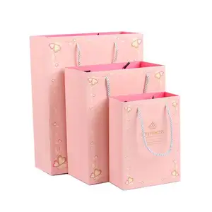 Bolsa de papel Kraft Natural para cuidado de la piel, producto para cuidado de la piel con cara sonriente, Logo dorado en relieve