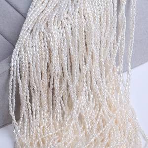 Perlas de Arroz Semiterminadas de Zhuji, 2-2.5mm, Blancas, con Defectos, de Luz Intensa, en Forma de Arroz, al por Mayor - Product Image 3