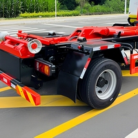Camion compacteur à bras hydraulique SAIC Yuejin Blue Label Diesel Euro 3 avec benne à ordures interchangeable pour le transfert de déchets