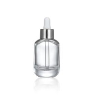 Vente en gros, flacon compte-gouttes cosmétique vide en verre transparent de 30ml, flacon de sérum d'huile essentielle avec compte-gouttes