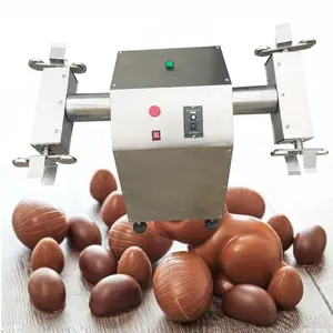 ईस्टर एग बॉल्स बनीज़ बियर चॉकलेट हार्ट्स के लिए स्वचालित खोखले चॉकलेट एग स्पिनर मशीन