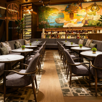Banc de restaurant moderne personnalisé en marbre rond avec revêtement en tissu et table, mobilier de salon pour café