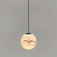 Lustre décoratif d'escalier boule ronde en albâtre design personnalisé Lustre à LED minimaliste en marbre naturel