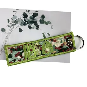 Porte-clés en tissu brodé avec logo, vente en gros, étiquettes de <span class=keywords><strong>vol</strong></span> de fournisseur personnalisées avec logo personnalisé - Product Image 1