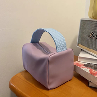 Vente en gros de trousse de toilette étanche avec logo personnalisé Trousse de maquillage de voyage cosmétique de grande capacité en cuir PU