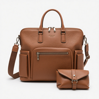Sac à langer multifonctionnel en cuir végétalien OEM convertible avec pochettes d'organisation et station de change