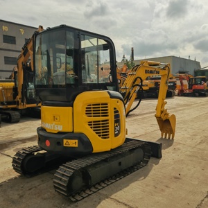 Mini-excavatrice sur chenilles Komatsu PC30 MR jaune, capacité de la benne de l'excavatrice Komatsu PC30 MR - Product Image 3