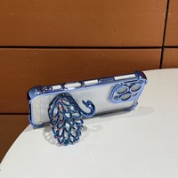 Support de téléphone de luxe en résine ajourée en forme de cygne avec miroir intégré et fixation adhésive pour utilisation sur lit