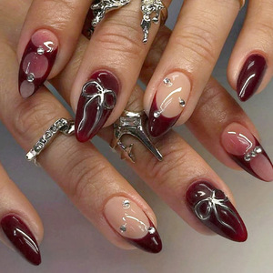 24 faux ongles rouges de festival, style French Press, en forme d'amande, avec nœud papillon argenté, réutilisables, prêts à poser, pour les fêtes - Product Image 1