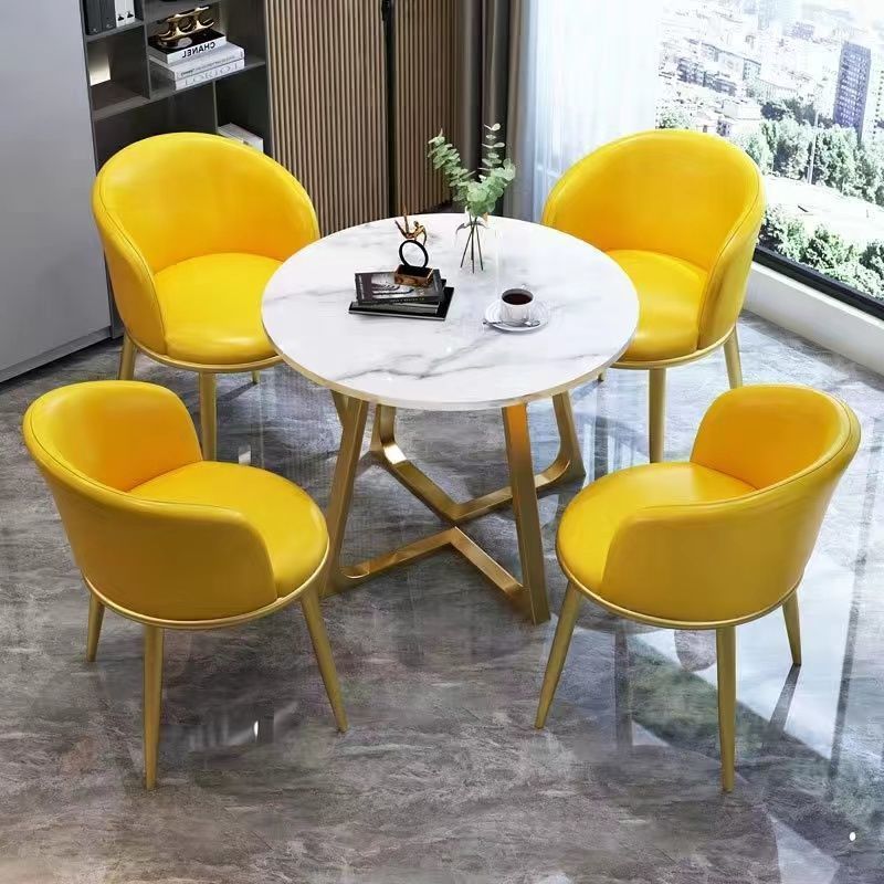 1 table pieds dorés+4 chaises cuir jaune
