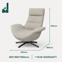 Fauteuil lounge ergonomique moderne à dossier haut en tissu avec base croisée pour zone de réception, bureau, usage commercial