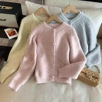 Pull en tricot de style coréen doux 2025 - Cardigan à boutons en forme de cœur pour femmes, tricot doux et polyvalent pour le printemps et l'automne