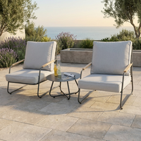Ensemble de chaises longues d'extérieur modernes et durables avec table ronde en acier et coussin gris pour balcon et jardin