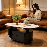 Table basse ovale moderne en marbre avec tiroirs de rangement et roulettes pour salon