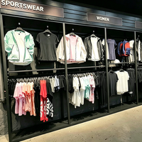 Étagères de magasin de vêtements de sport personnalisées, murs de présentation de chaussures de style entrepôt, présentoirs de chaussures pour magasins de liquidation, armoires de présentation de chaussures pour magasins à prix réduits