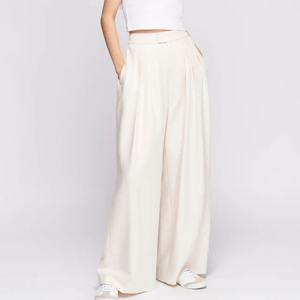 กางเกงพลีทขาบานเอวสูงสไตล์ลำลองสำหรับผู้หญิง รับผลิตตามสั่งขายส่ง - Product Image 1