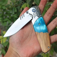 Couteau de chasse pliant portable en acier inoxydable avec manche en bois d'olivier et résine, idéal pour le camping et les activités de plein air, vente en gros pour petites commandes