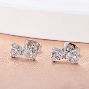 Boucles d'oreilles tendance en acier titane avec nœud étoile et zircon, forme fleur, style luxe léger et simple, pour soirée, vente en gros - Product Image 3