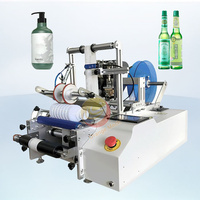 Professionnel manuel semi-automatique imprimer un applicateur de petite machine d'étiquettes d'autocollant pour bouteille d'eau ronde