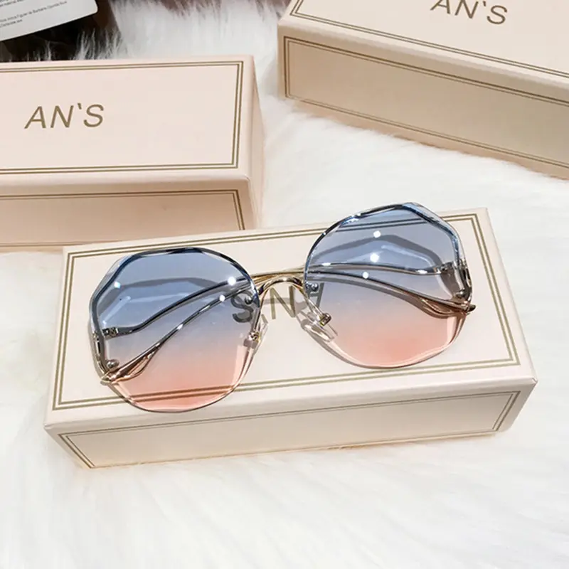 Meilleur prix de Fabricant chinois Monture en métal Trendy Top Classic Lunettes de soleil de luxe sans monture personnalisées pour femmes