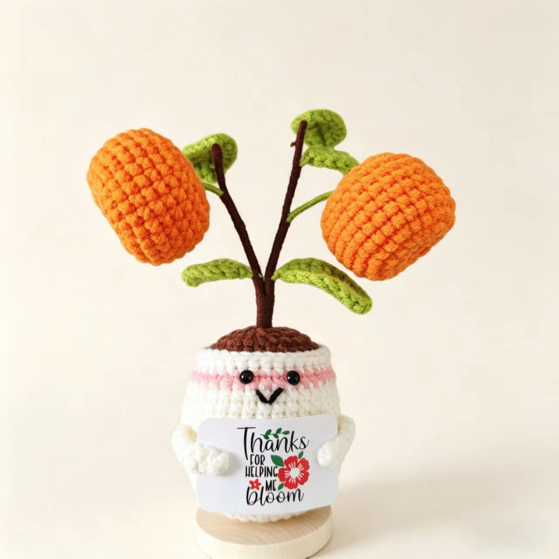 Planta en maceta naranja
