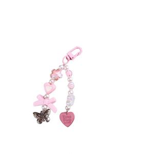 Llavero de moda para mujer con colgante creativo para teléfono móvil y cadena decorativa, estilo INS, novedoso y atractivo. - Product Image 1