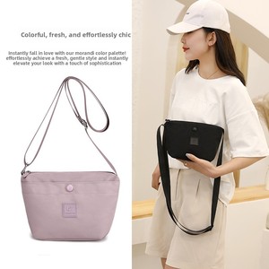 กระเป๋าสะพายไหล่ผู้หญิงอเนกประสงค์แฟชั่นใหม่สีสันสดใสสำหรับทำงาน, กระเป๋าสะพายข้างแบบเรียบง่าย, กระเป๋าไนลอนกันน้ำแบบส่วนตัว - Product Image 1