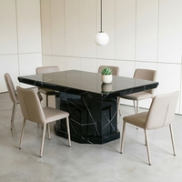 Table à manger géométrique moderne avant-gardiste à base lourde en marbre Nero Marquina pour salles à manger de villas de luxe et espaces artistiques de créateurs
