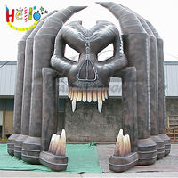 Structure gonflable de porte d'entrée en forme de crâne d'Halloween avec dents de loup