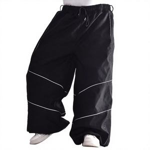 Pantalon de ski unisexe grande taille coupe ample taille élastique décontracté couleur unie léger polyester coupe ample imperméable coupe-vent haute performance - Product Image 1