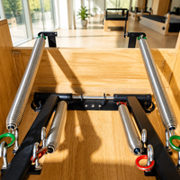 Chaise de Pilates portable en bois de chêne durable avec pédale et poignées pour équipement d'entraînement corporel professionnel en studio