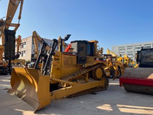 รถดันดิน CAT D6R มือสอง พร้อมอุปกรณ์ริปเปอร์ เหมาะสำหรับงานดินขุด งานเหมืองแบบเปิด งานถนนในหมู่บ้าน งานตัดแต่งพื้นที่ลาดชัน และงานปรับระดับพื้นดิน - Product Image 1